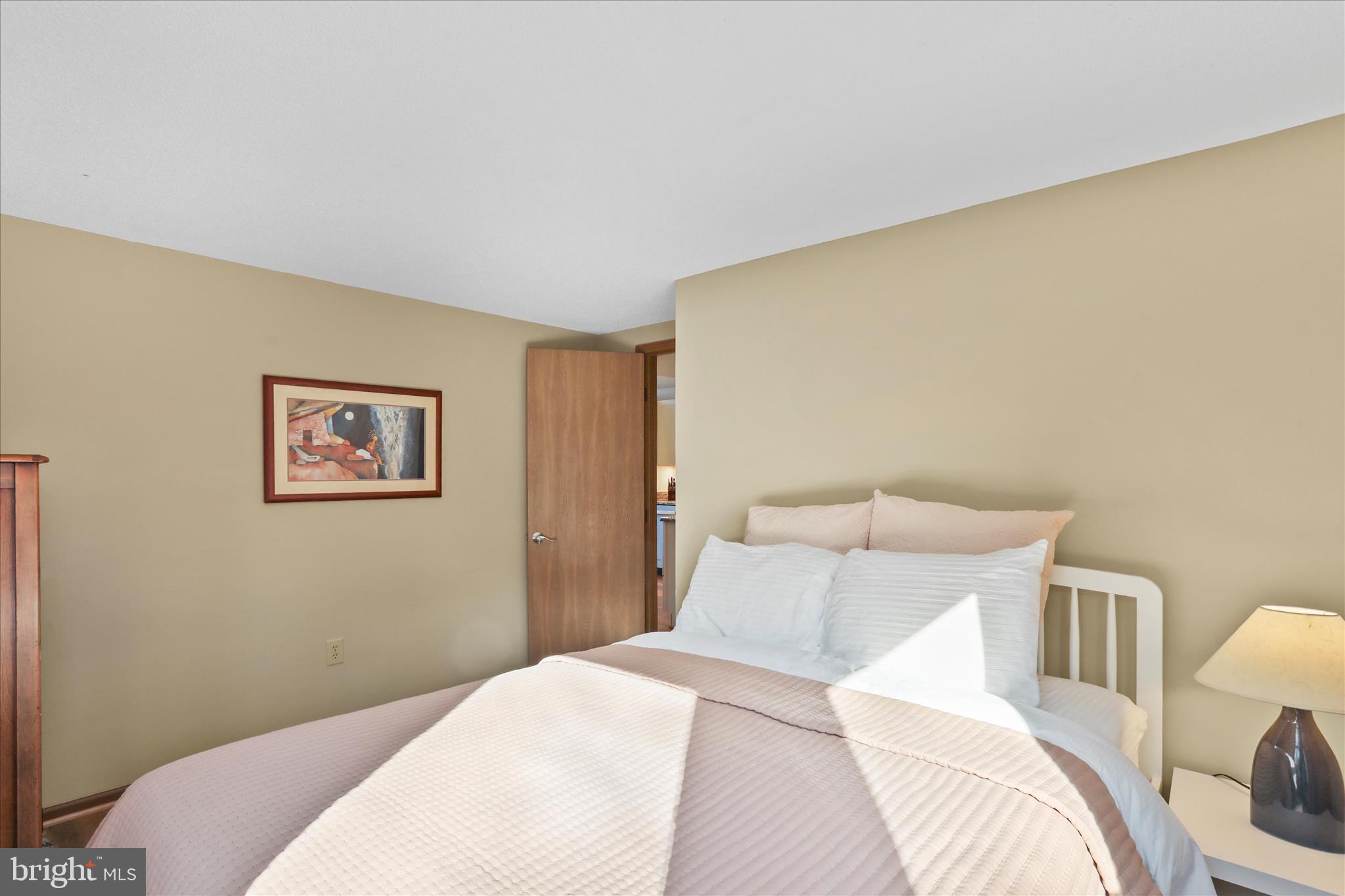 321 Clubhouse Ridge Hedgesville, WV 25427 - Photo 15 of 36 a bedroom with a bed and couch