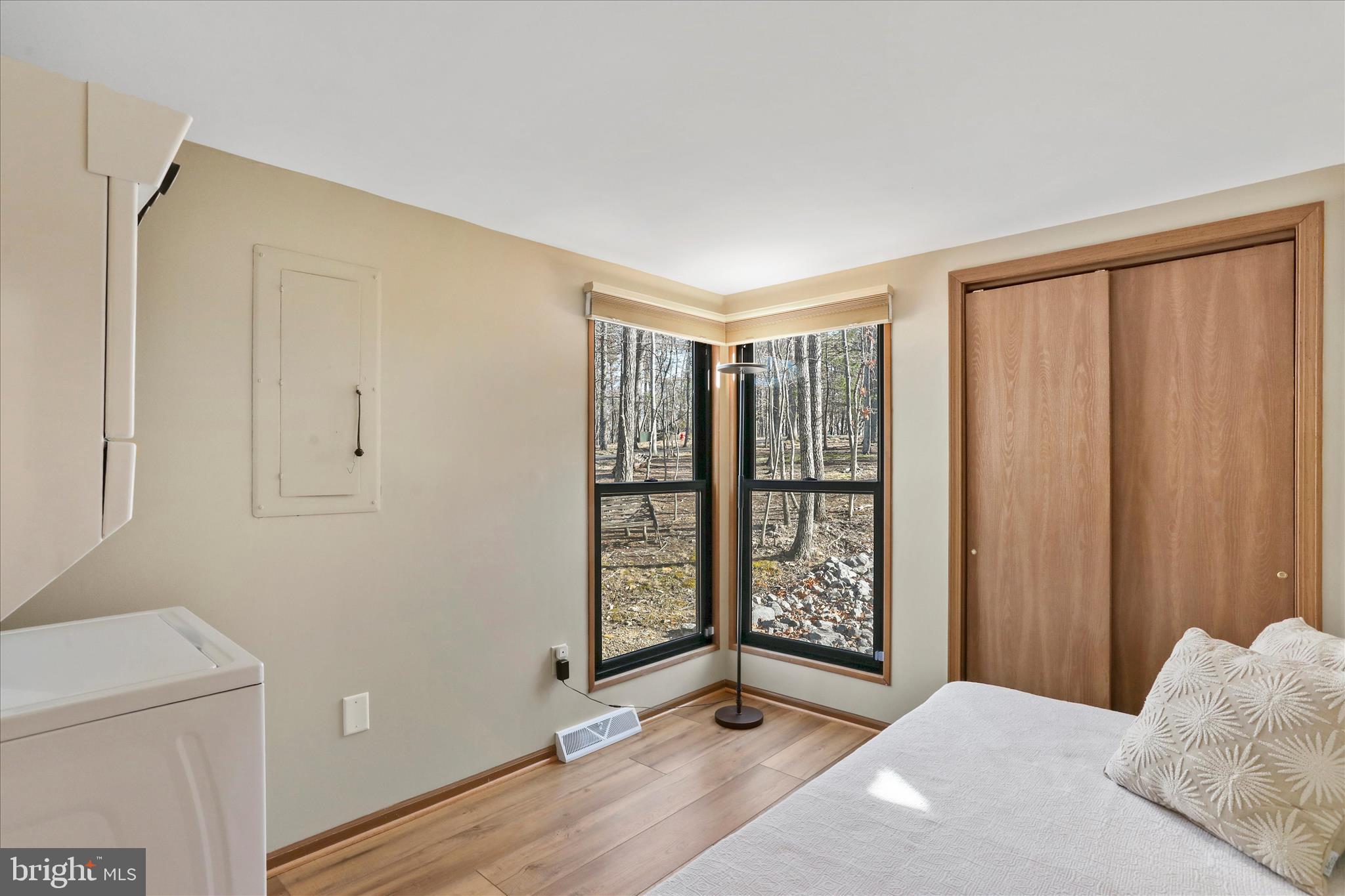 321 Clubhouse Ridge Hedgesville, WV 25427 - Photo 16 of 36 a bedroom with a bed and a window