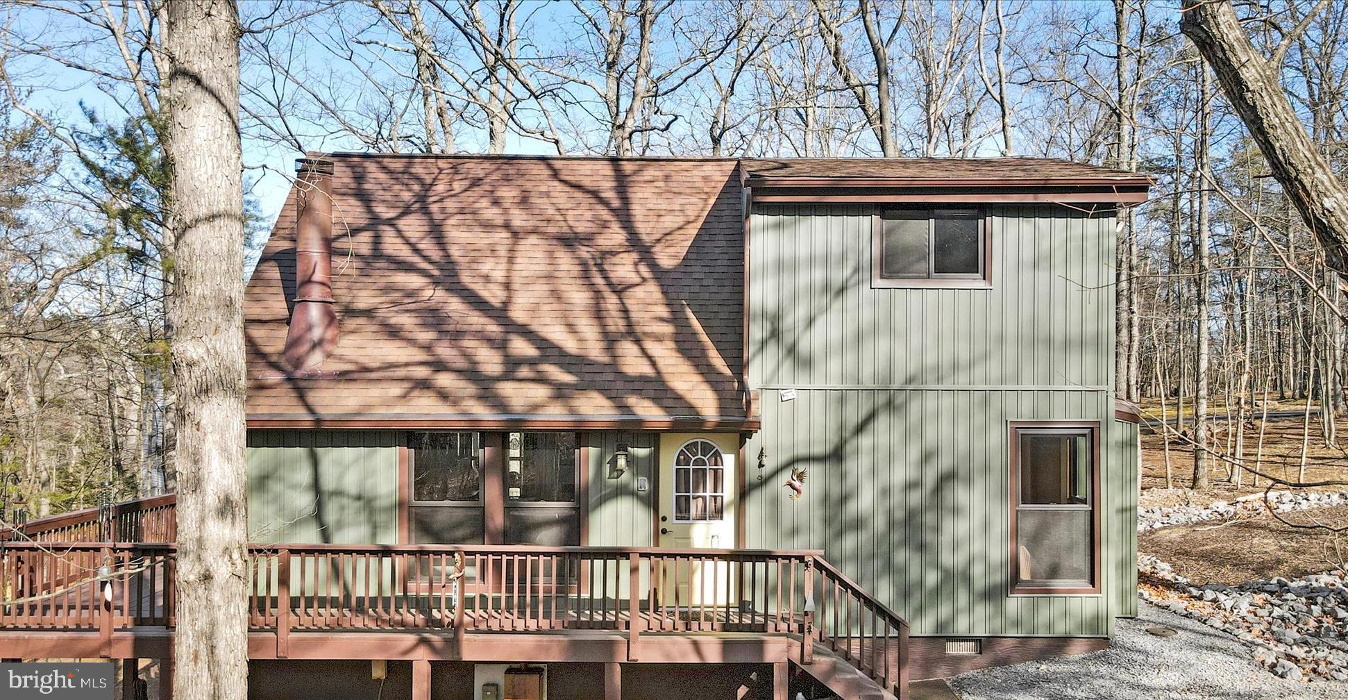 321 Clubhouse Ridge Hedgesville, WV 25427 - Photo 2 of 36 a view of a house with a large window