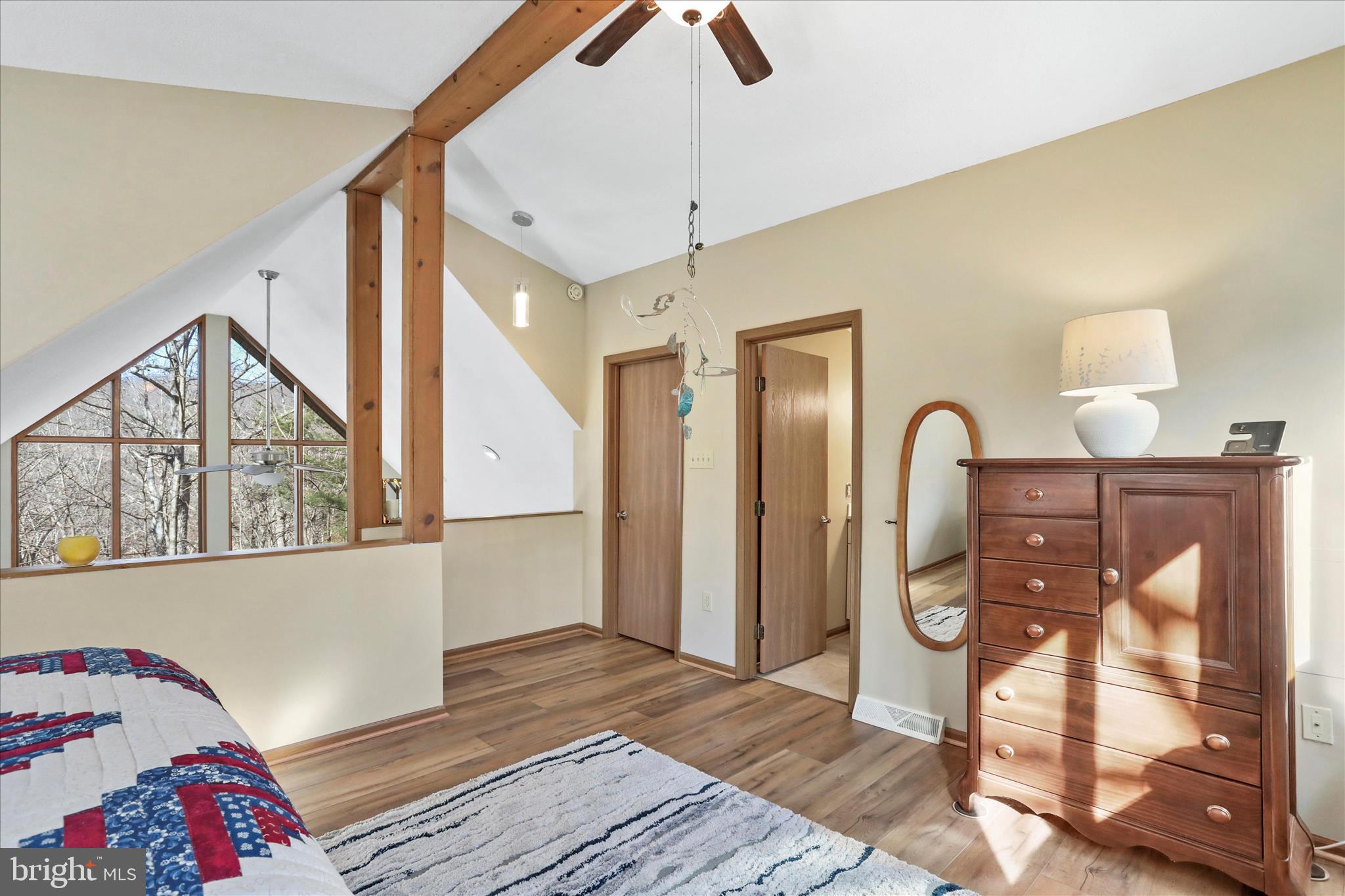 321 Clubhouse Ridge Hedgesville, WV 25427 - Photo 22 of 36 a view of bedroom with furniture and wooden floor