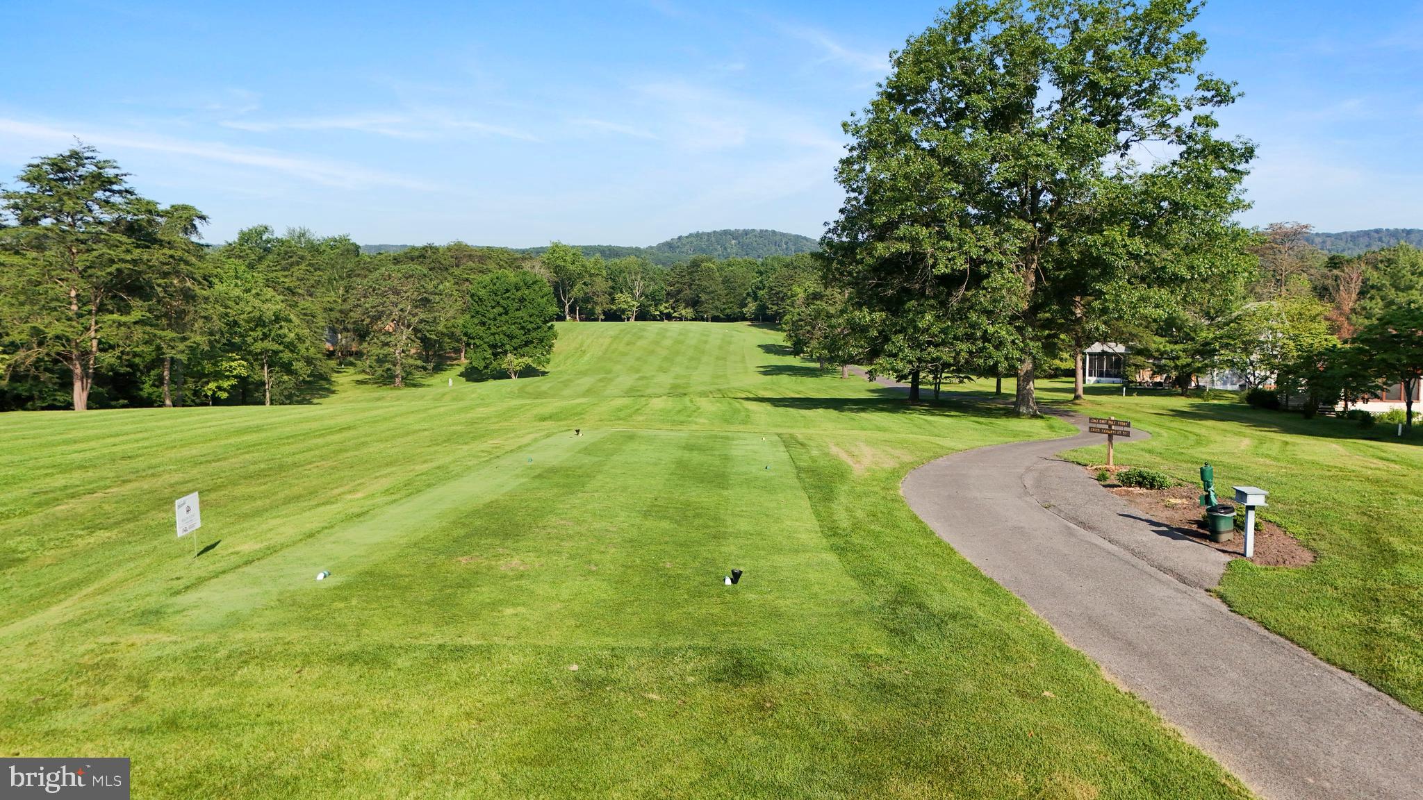 321 Clubhouse Ridge Hedgesville, WV 25427 - Photo 30 of 36 a view of a golf course with a garden