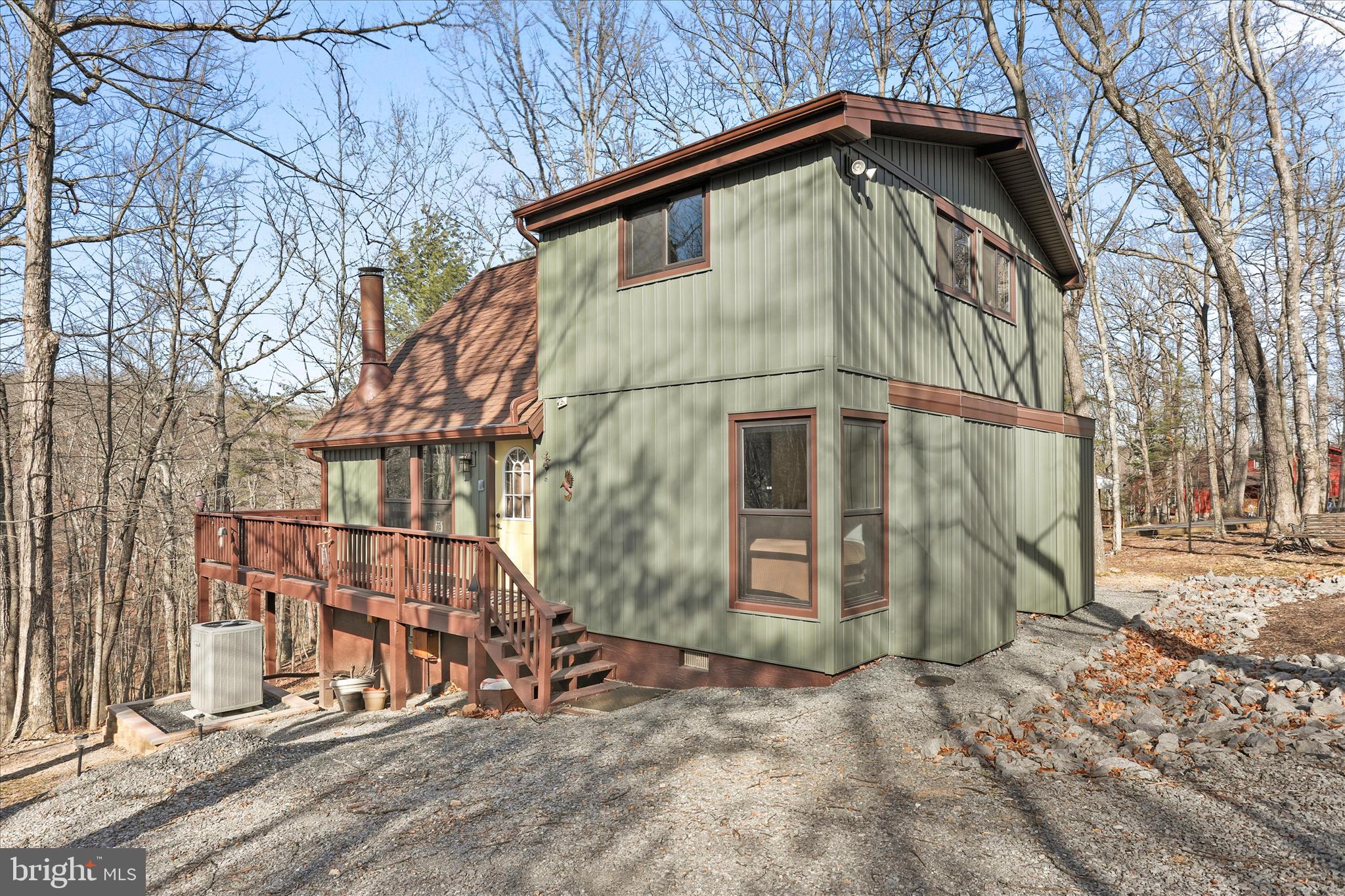 321 Clubhouse Ridge Hedgesville, WV 25427 - Photo 3 of 36 a view of a house with a yard