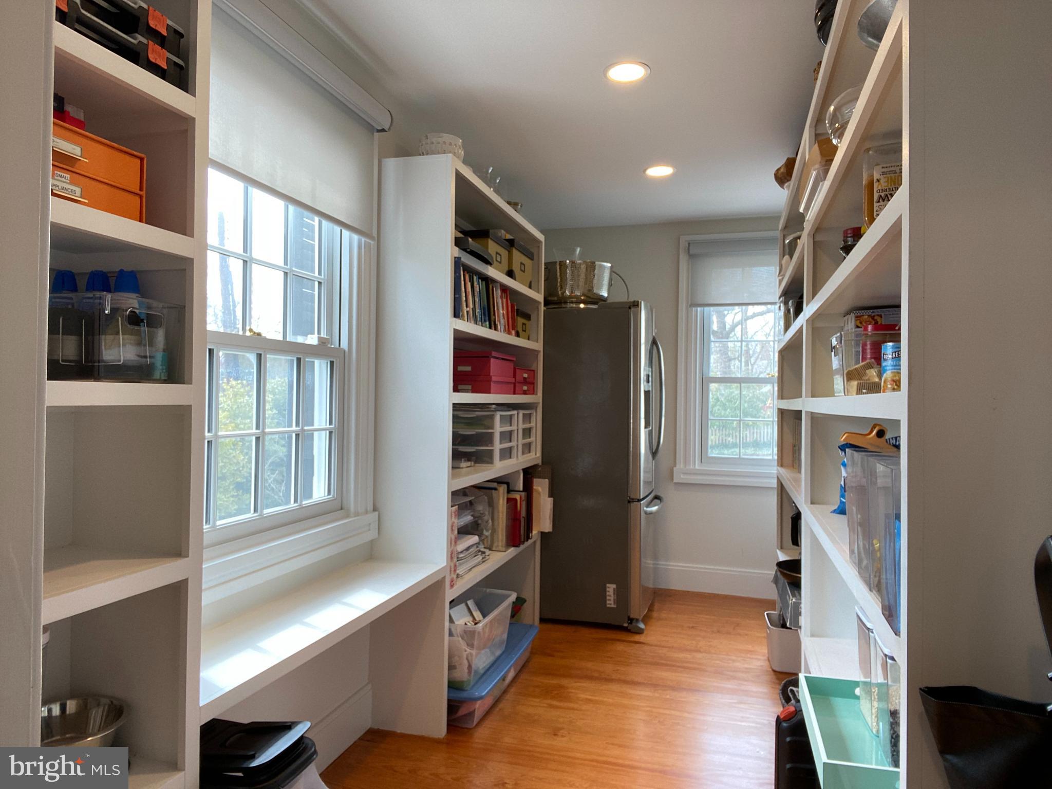 121 Upnor Road Baltimore, MD 21212 - Photo 40 of 79 a view of walk in closet with clothes and shoes