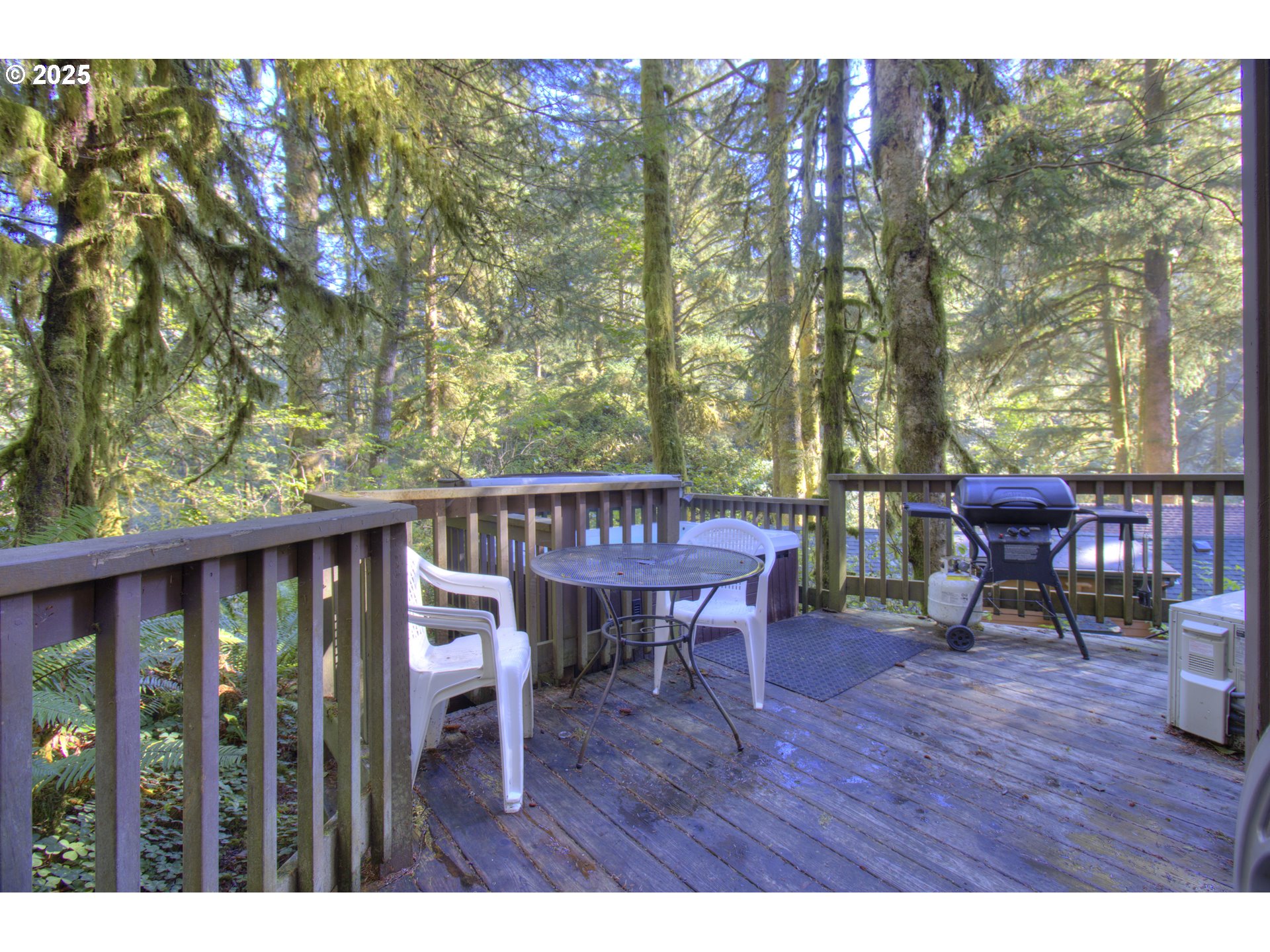 19921 Whaleshead Road, Unit C15 Brookings, OR 97415 - Photo 4 of 14 a view of a chairs and table in patio