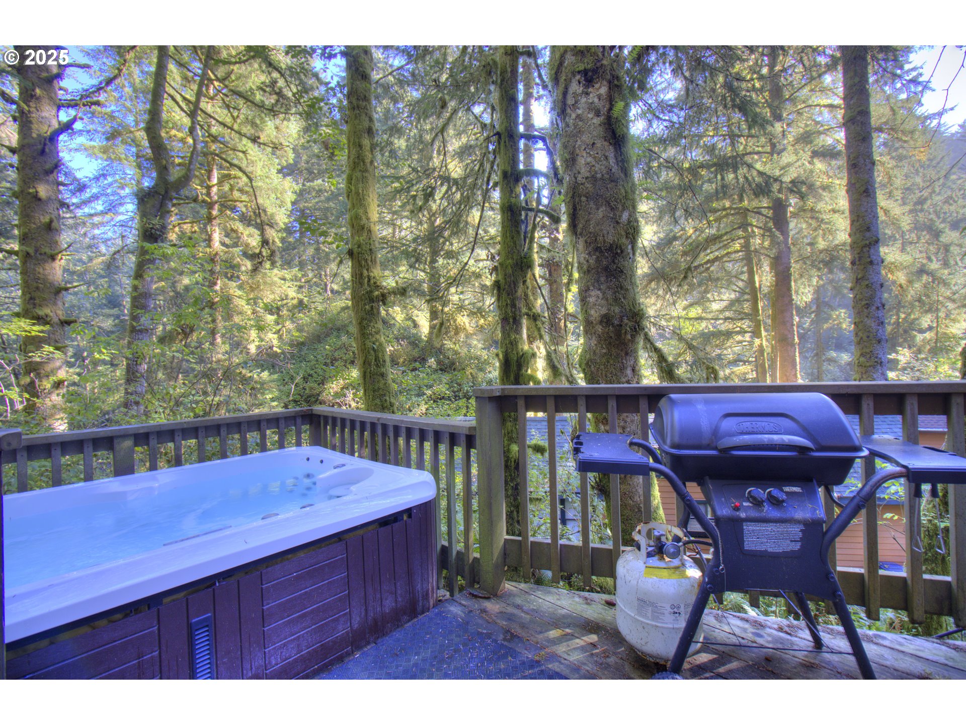 19921 Whaleshead Road, Unit C15 Brookings, OR 97415 - Photo 6 of 14 a view of a chairs and tables on the deck