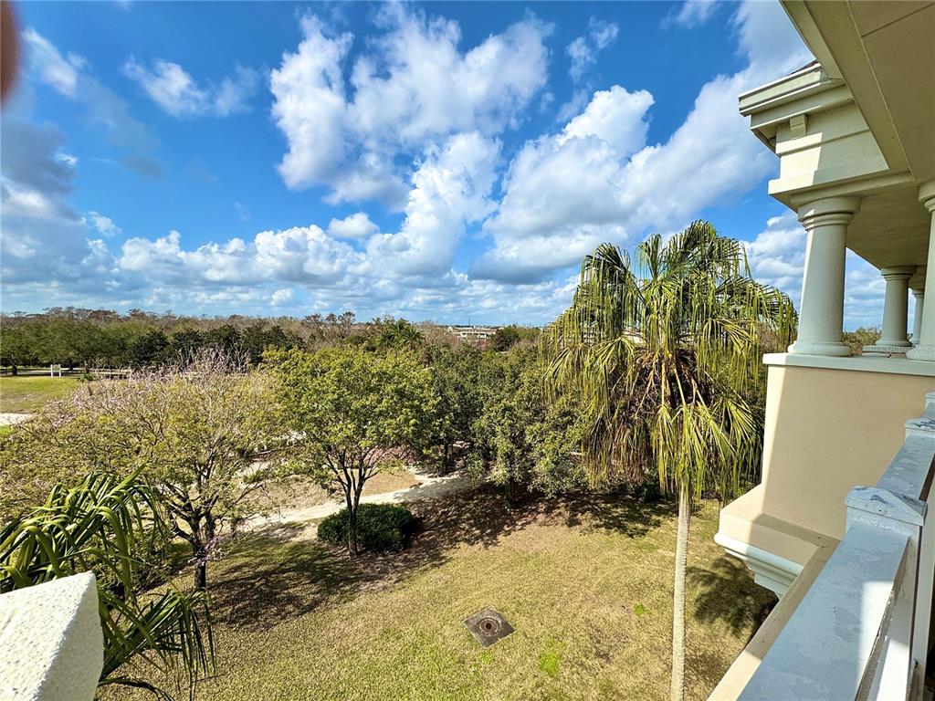 1350 Centre Ct Ridge Drive, Unit 401 Reunion, FL 34747 - Photo 31 of 32 a view of a yard