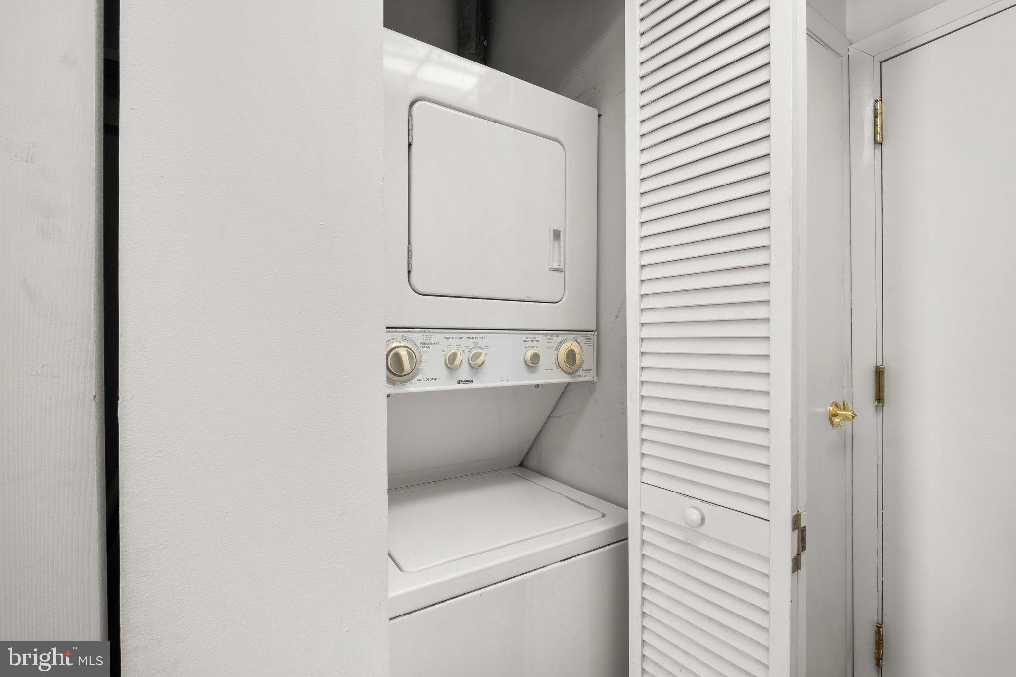 1763 Columbia Road Northwest, Unit 510 Washington, DC 20009 - Photo 11 of 17 a utility room with dryer and washer