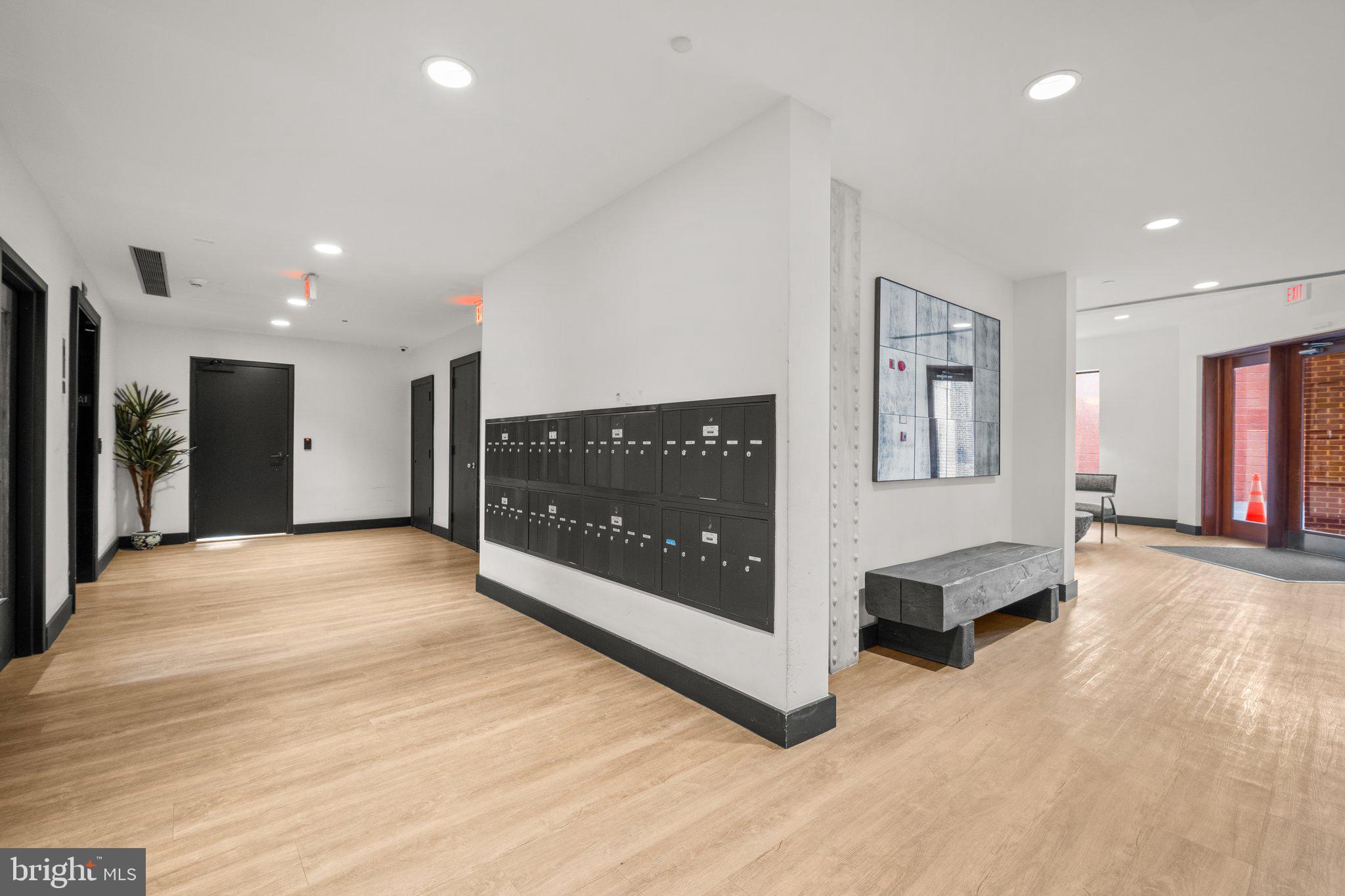 1763 Columbia Road Northwest, Unit 510 Washington, DC 20009 - Photo 2 of 17 a view of livingroom with furniture and a flat screen tv