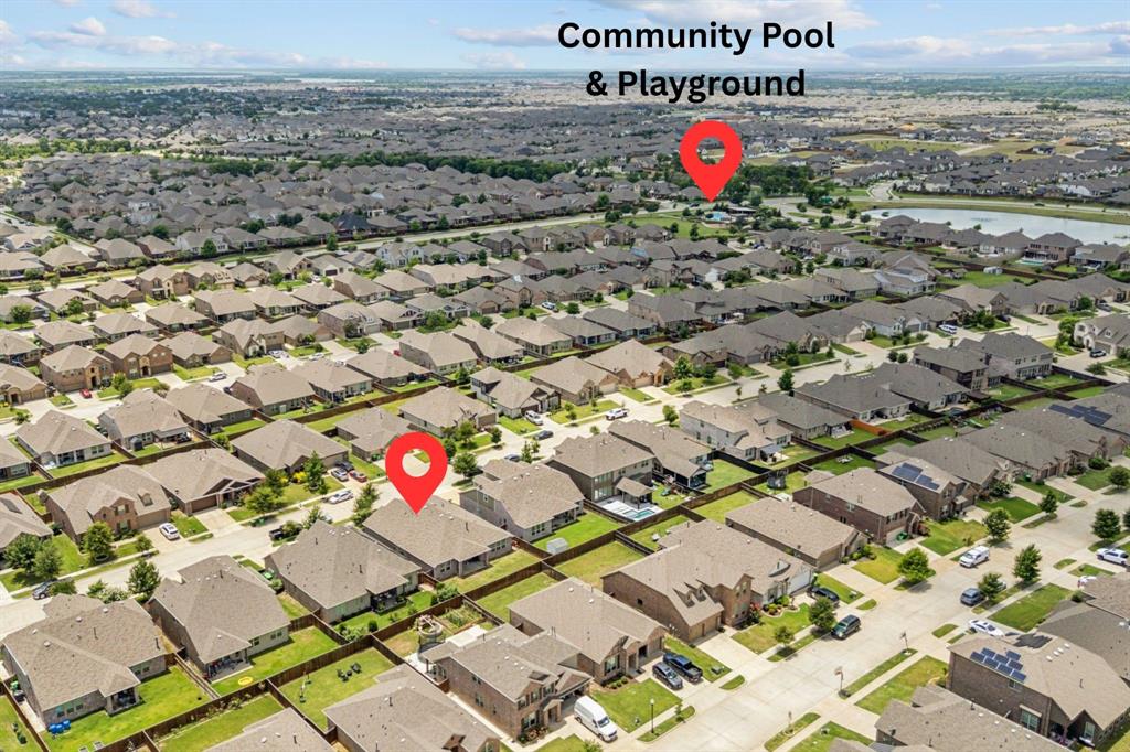 1813 Drover Creek Road Aubrey, TX 76227 - Photo 27 of 36 An easy walk to the pool, playground, and ponds!