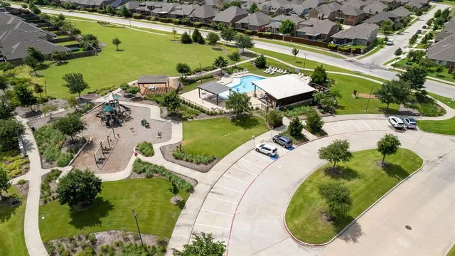 an aerial view of a house with a ocean view