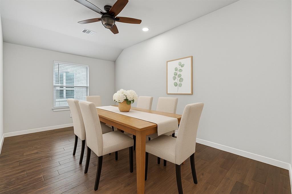 1813 Drover Creek Road Aubrey, TX 76227 - Photo 4 of 36 Large dining room space opens up to living room perfect for entertaining! This has been virtually staged*