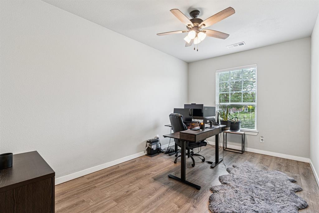 1813 Drover Creek Road Aubrey, TX 76227 - Photo 7 of 36 Large home office featuring LVP floors.