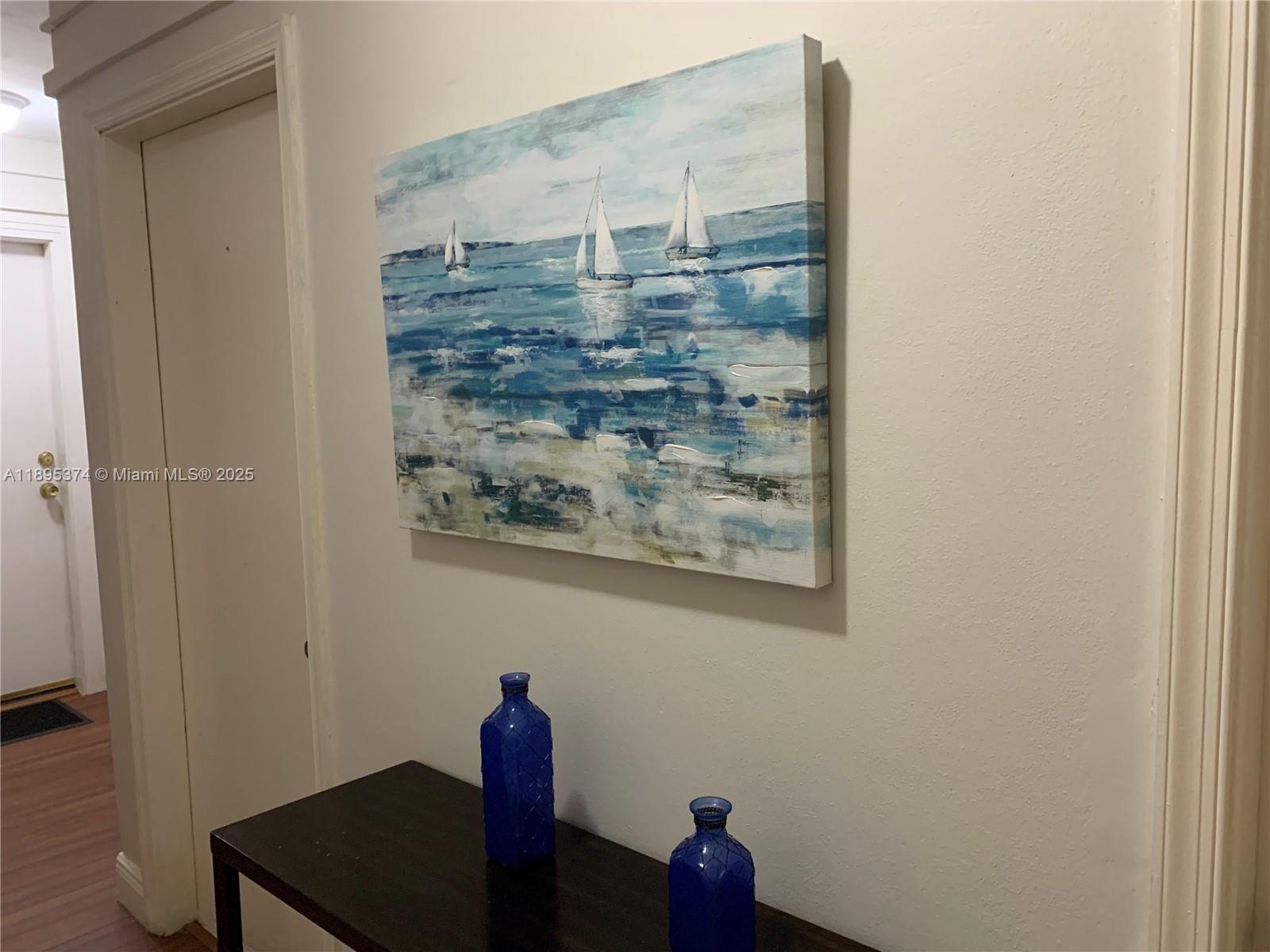 555 Crandon Boulevard, Unit 53 Key Biscayne, FL 33149 - Photo 33 of 33 a view of a hallway with a small space