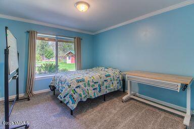 121 Rattlesnake Lane Naches, WA 98937 - Photo 19 of 45 a bedroom with a bed and a window