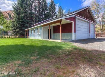 121 Rattlesnake Lane Naches, WA 98937 - Photo 26 of 45 a view of a house with yard and tree s