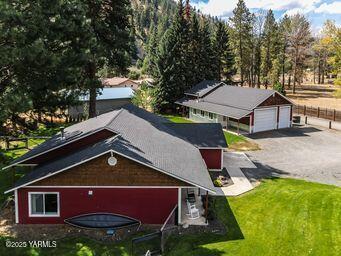 121 Rattlesnake Lane Naches, WA 98937 - Photo 38 of 45 a aerial view of a house with swimming pool next to a yard
