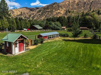 121 Rattlesnake Lane Naches, WA 98937 - Photo 39 of 45 a front view of a house with garden
