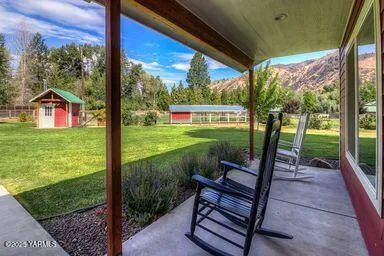 a view of a bench in the porch