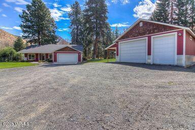 121 Rattlesnake Lane Naches, WA 98937 - Photo 42 of 45 a view of a house with a yard