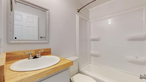 1051 Brandon Hollow Road Lynchburg, TN 37352 - Photo 21 of 36 a bathroom with a sink toilet and shower