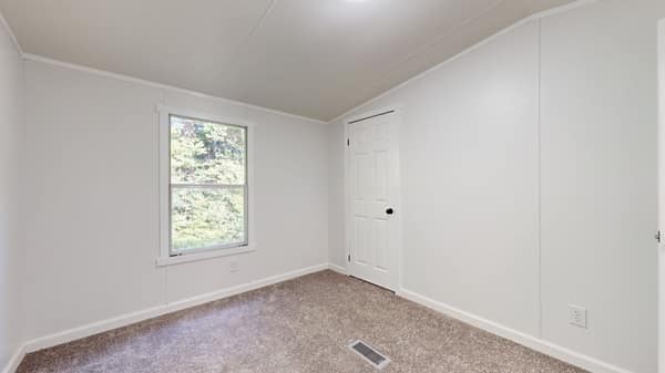 1051 Brandon Hollow Road Lynchburg, TN 37352 - Photo 24 of 36 an empty room with a window