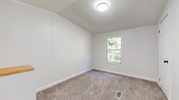 1051 Brandon Hollow Road Lynchburg, TN 37352 - Photo 25 of 36 an empty room with windows