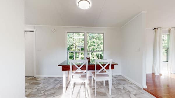1051 Brandon Hollow Road Lynchburg, TN 37352 - Photo 28 of 36 a dining room with furniture and window