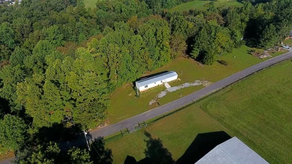 1051 Brandon Hollow Road Lynchburg, TN 37352 - Photo 10 of 36 a view of a yard with chairs