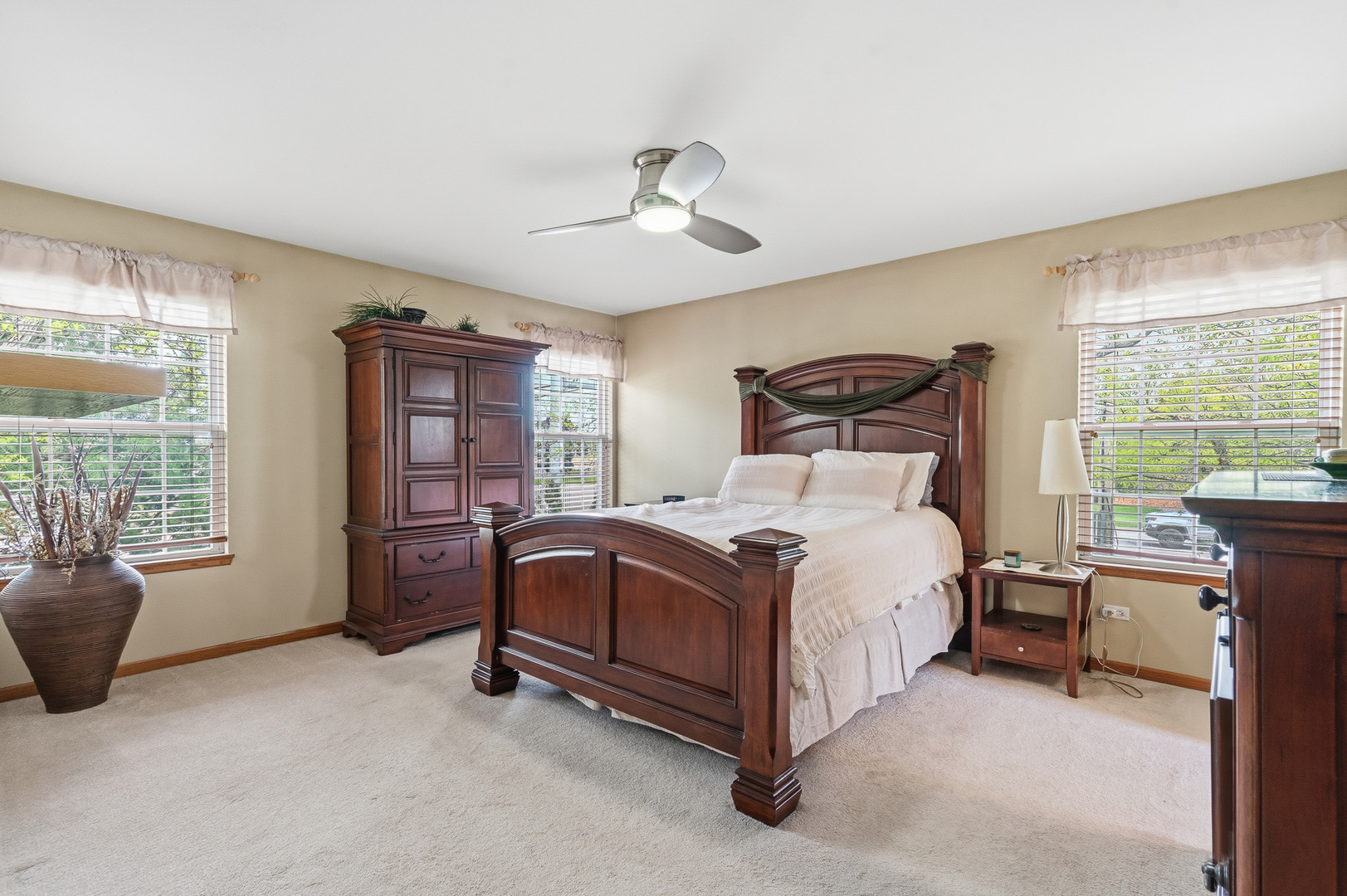 16719 South Sunset Ridge Court Lockport, IL 60441 - Photo 13 of 31 a bed room with a bed and a window