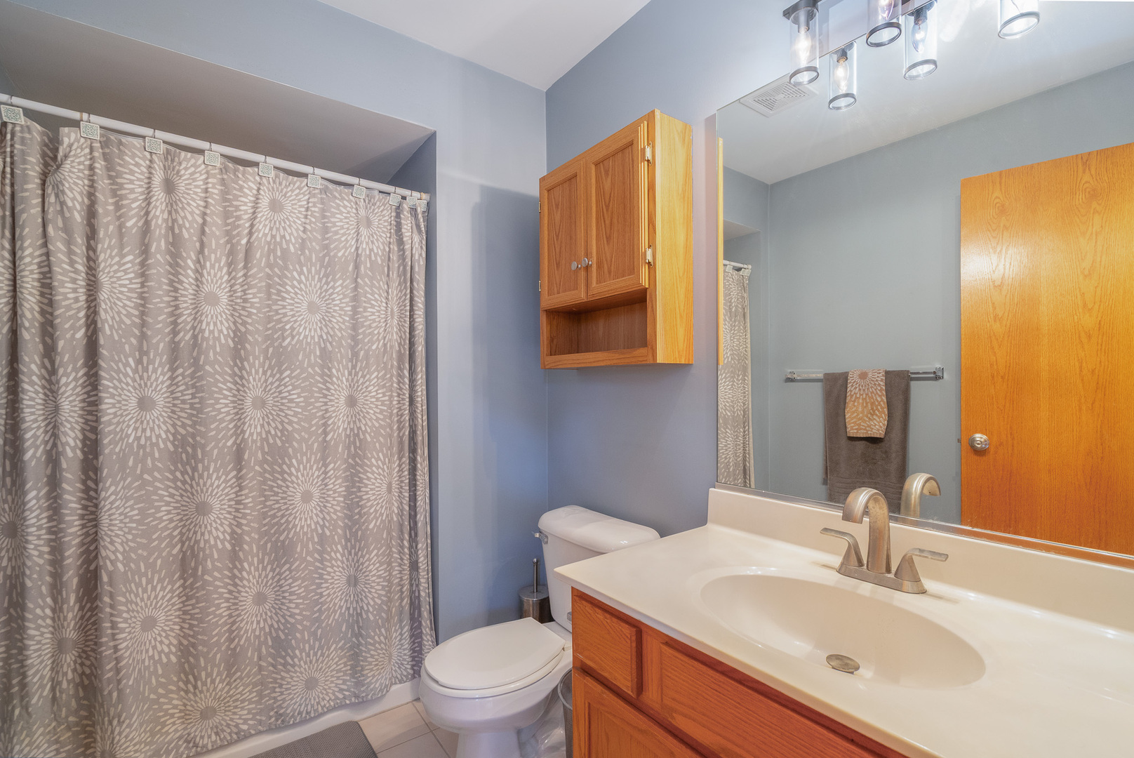 16719 South Sunset Ridge Court Lockport, IL 60441 - Photo 15 of 31 a bathroom with a sink vanity mirror and toilet