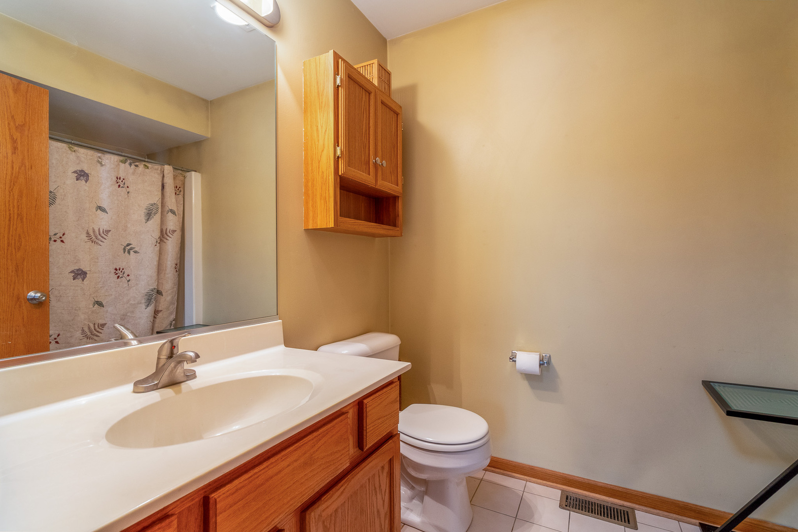 16719 South Sunset Ridge Court Lockport, IL 60441 - Photo 17 of 31 a bathroom with a sink and a toilet