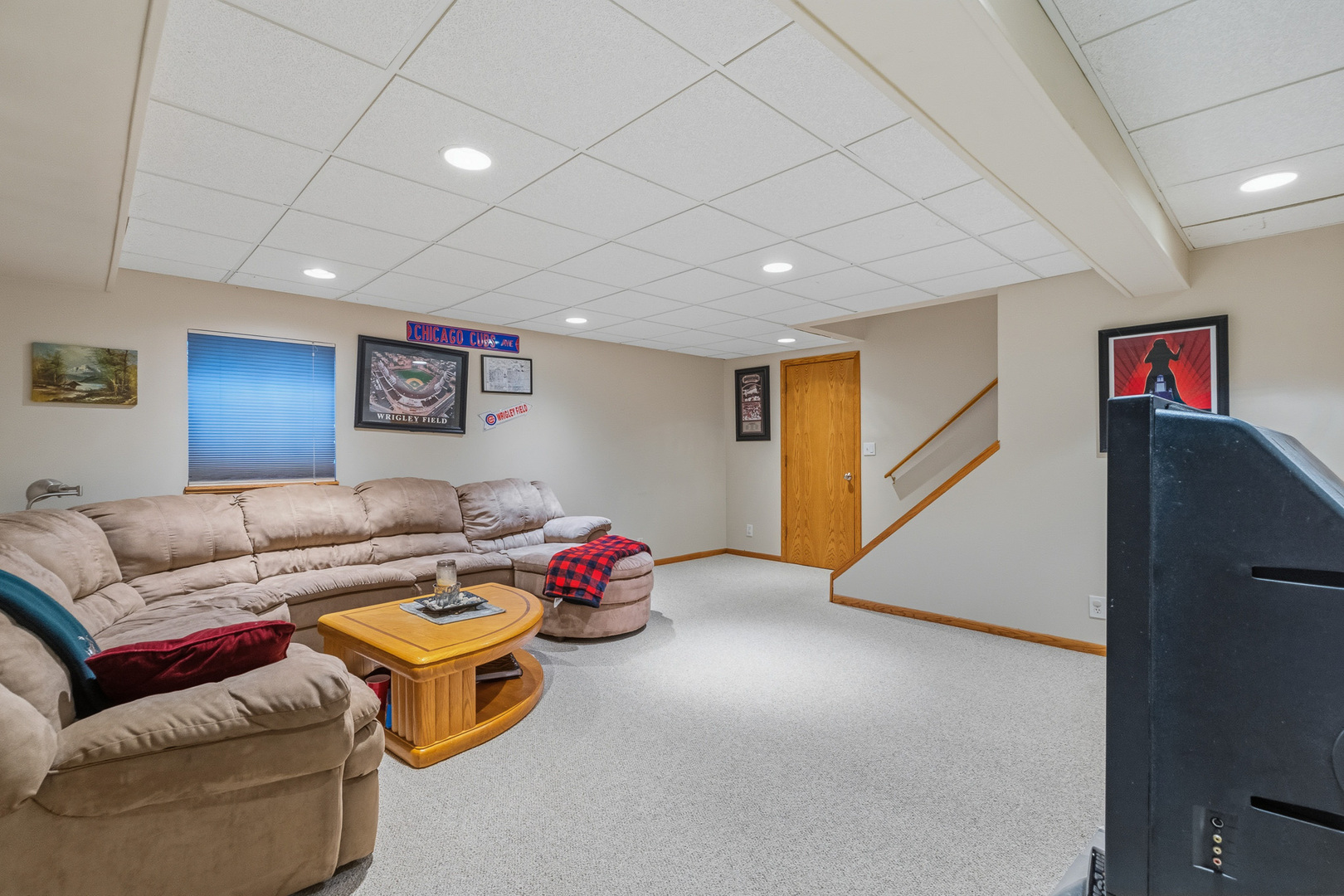 16719 South Sunset Ridge Court Lockport, IL 60441 - Photo 19 of 31 a bedroom with furniture and a flat screen tv