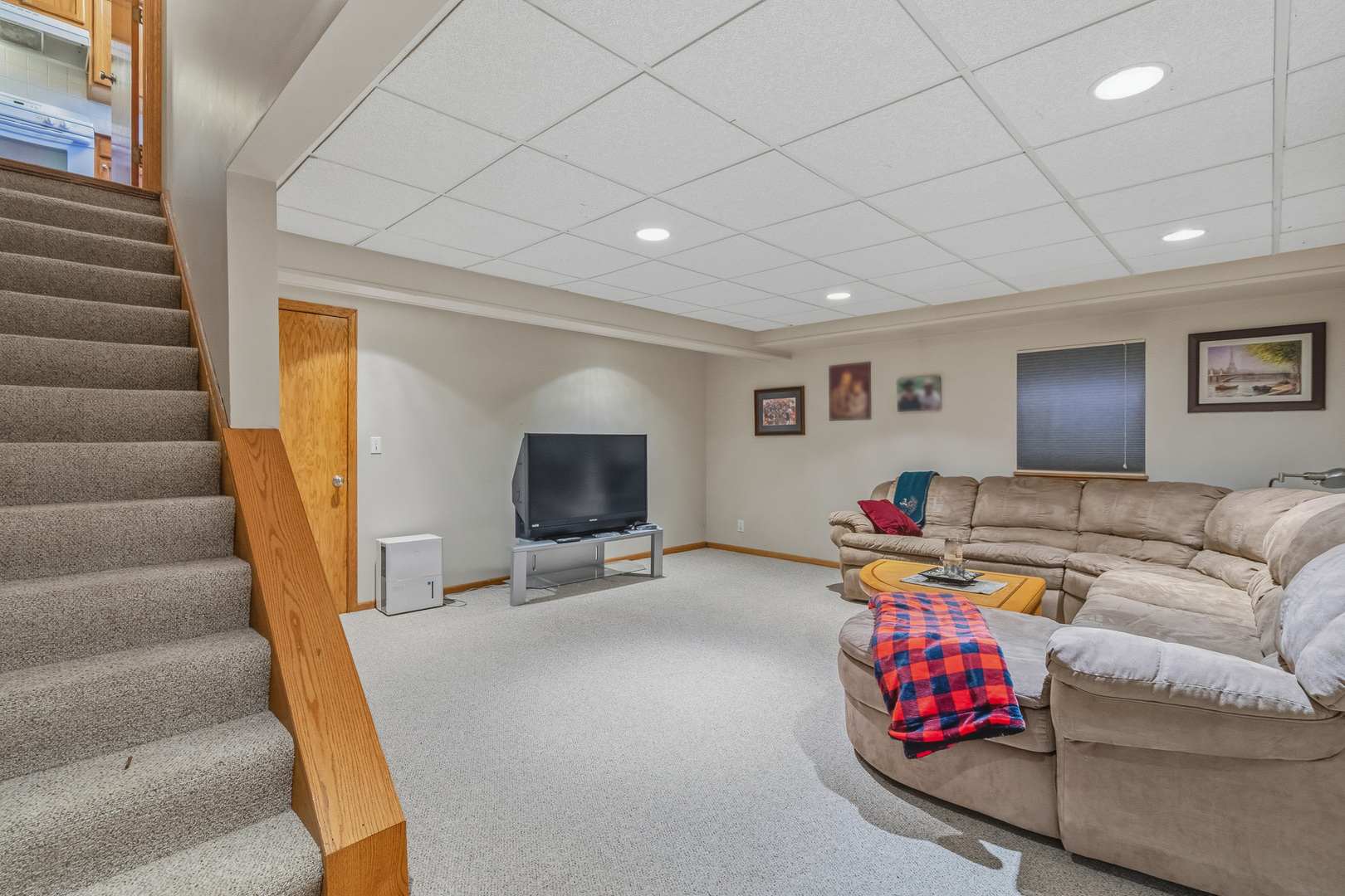 16719 South Sunset Ridge Court Lockport, IL 60441 - Photo 20 of 31 a living room with furniture and a flat screen tv