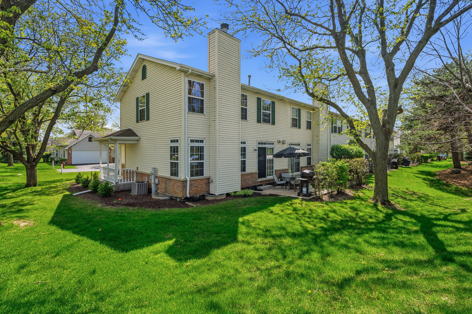 16719 South Sunset Ridge Court Lockport, IL 60441 - Photo 21 of 31 a view of a house with a yard and sitting area