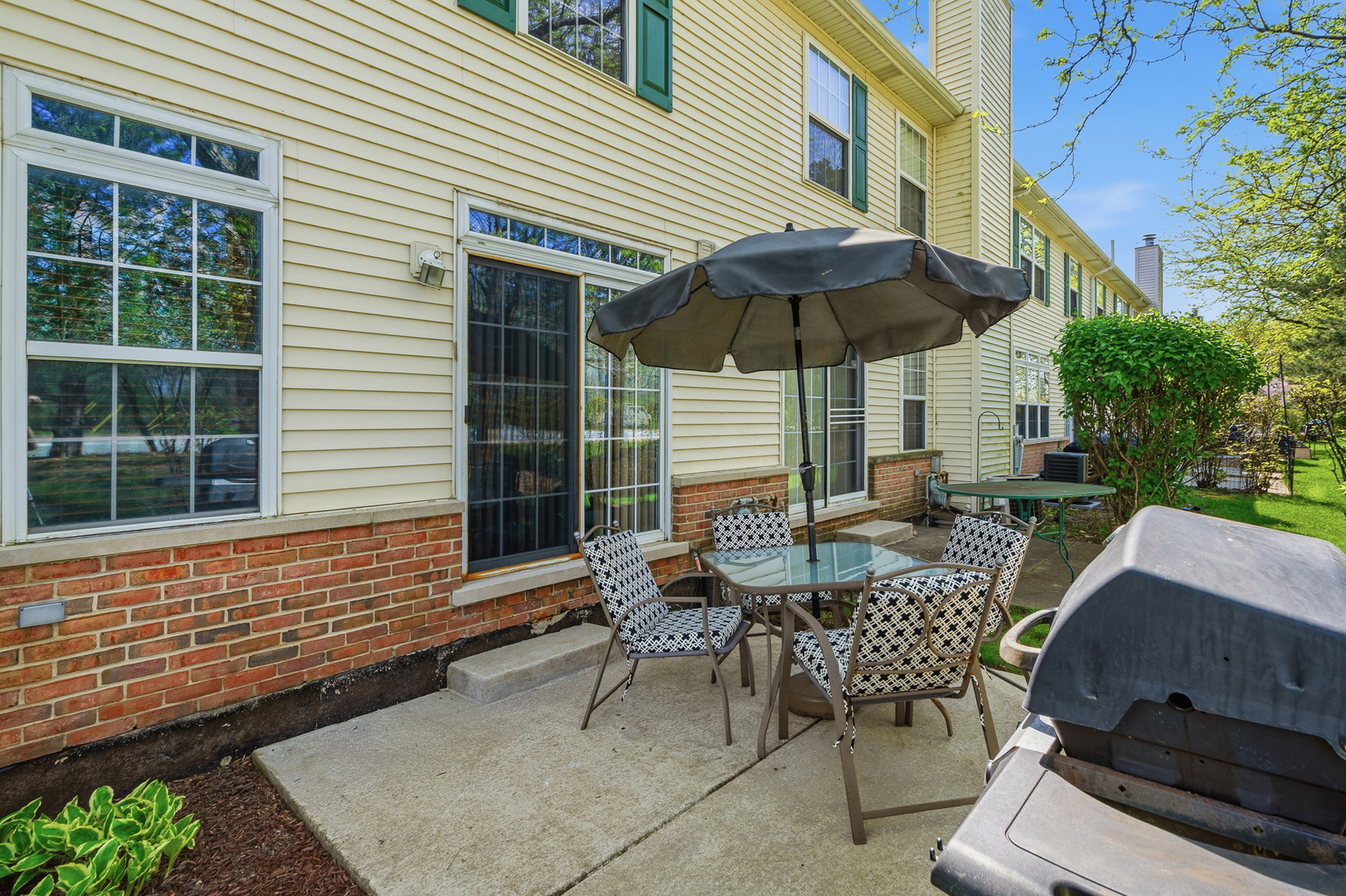 16719 South Sunset Ridge Court Lockport, IL 60441 - Photo 23 of 31 a view of backyard with outdoor seating and wooden floor