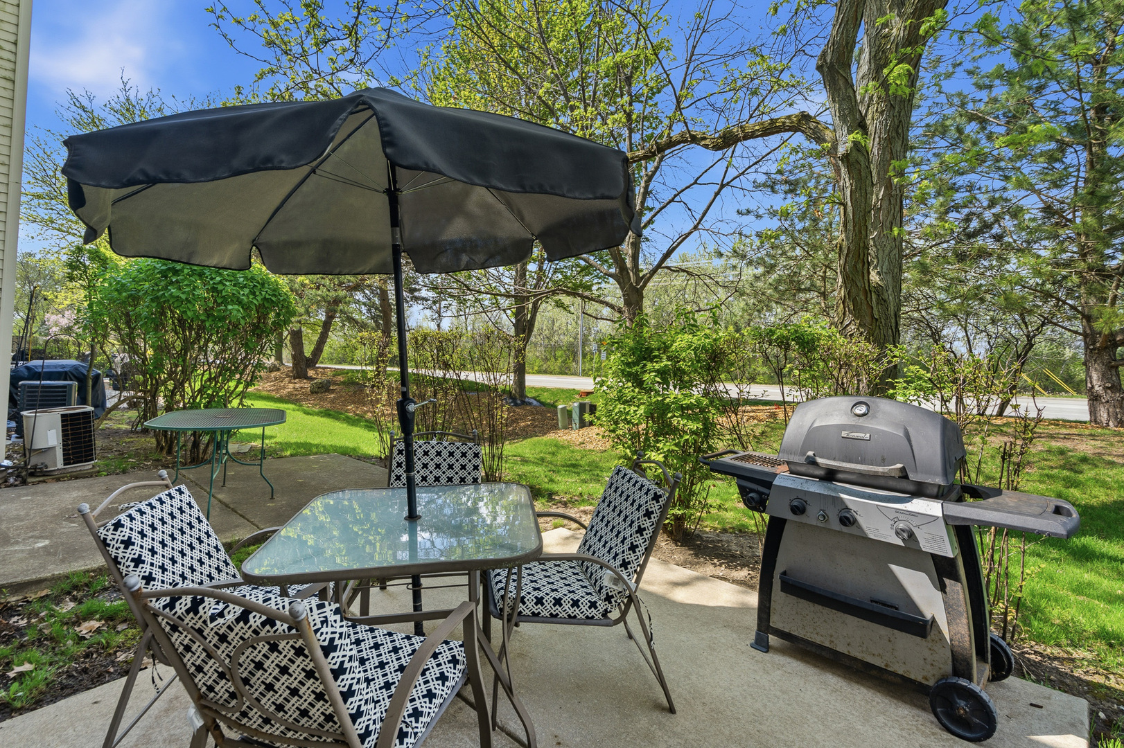 16719 South Sunset Ridge Court Lockport, IL 60441 - Photo 24 of 31 a view of backyard with seating space and trees