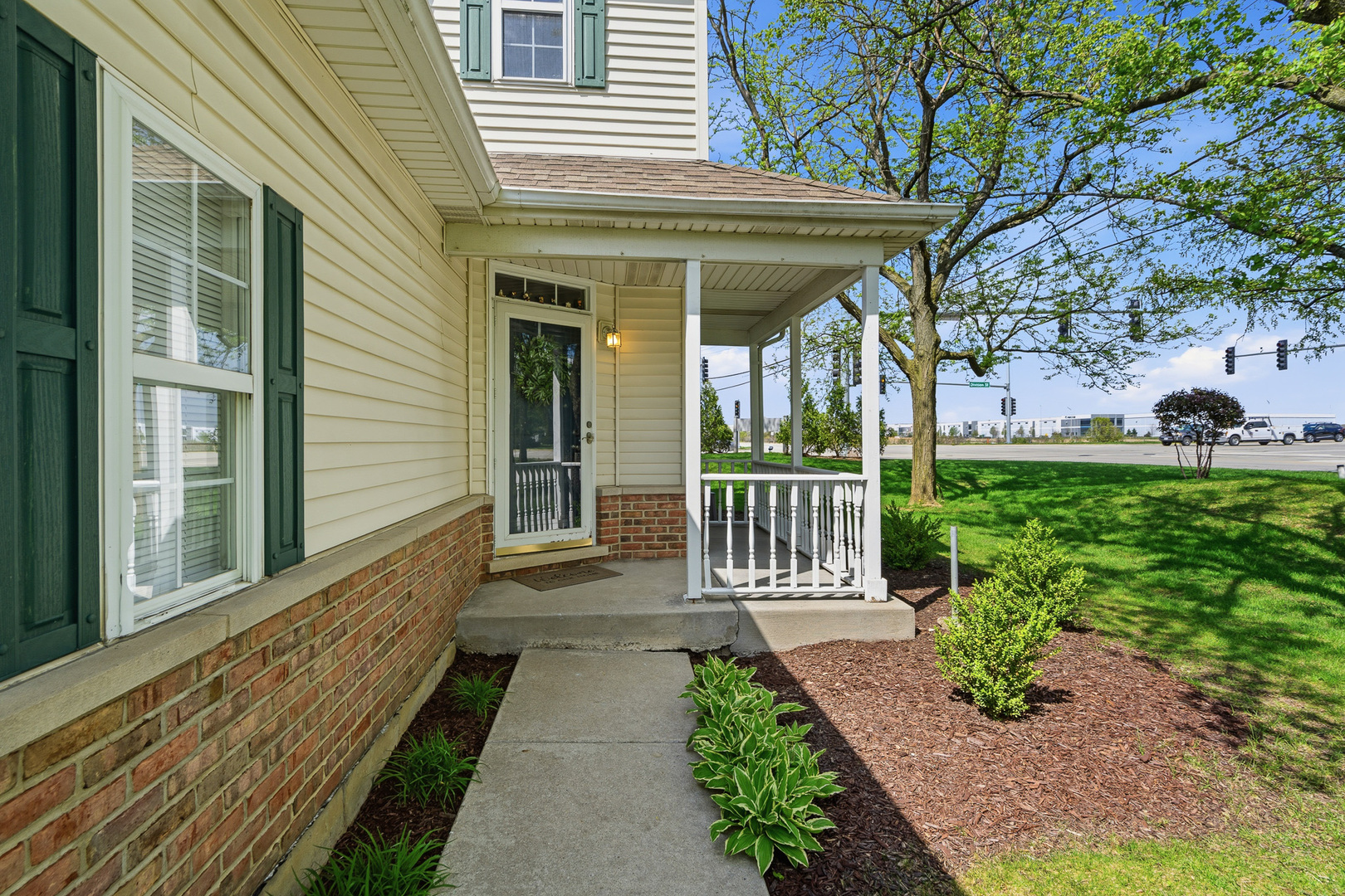 16719 South Sunset Ridge Court Lockport, IL 60441 - Photo 27 of 31 a view of a house with a small yard and wooden floor and fence
