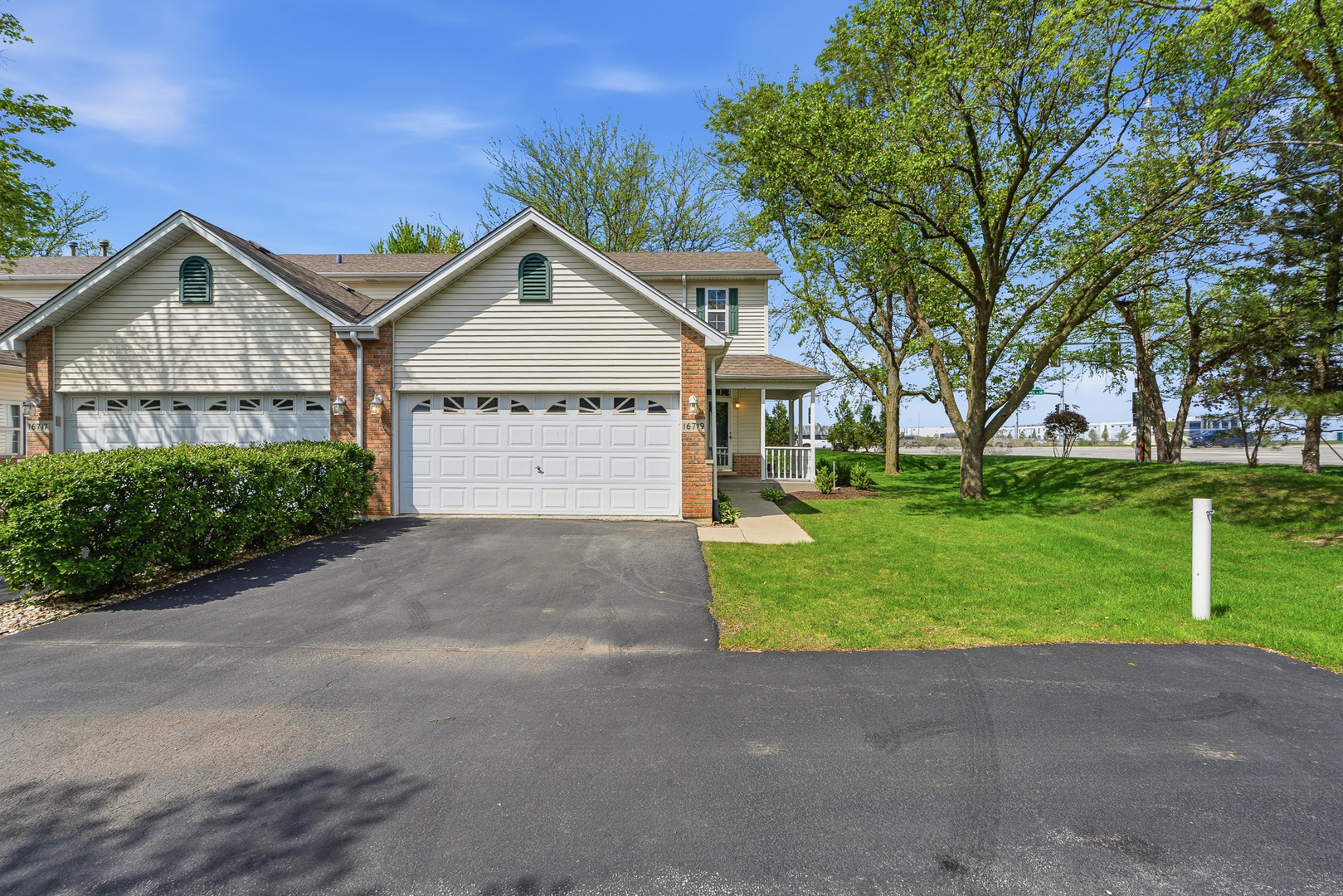 16719 South Sunset Ridge Court Lockport, IL 60441 - Photo 30 of 31 a view of a big house with a big yard and palm trees