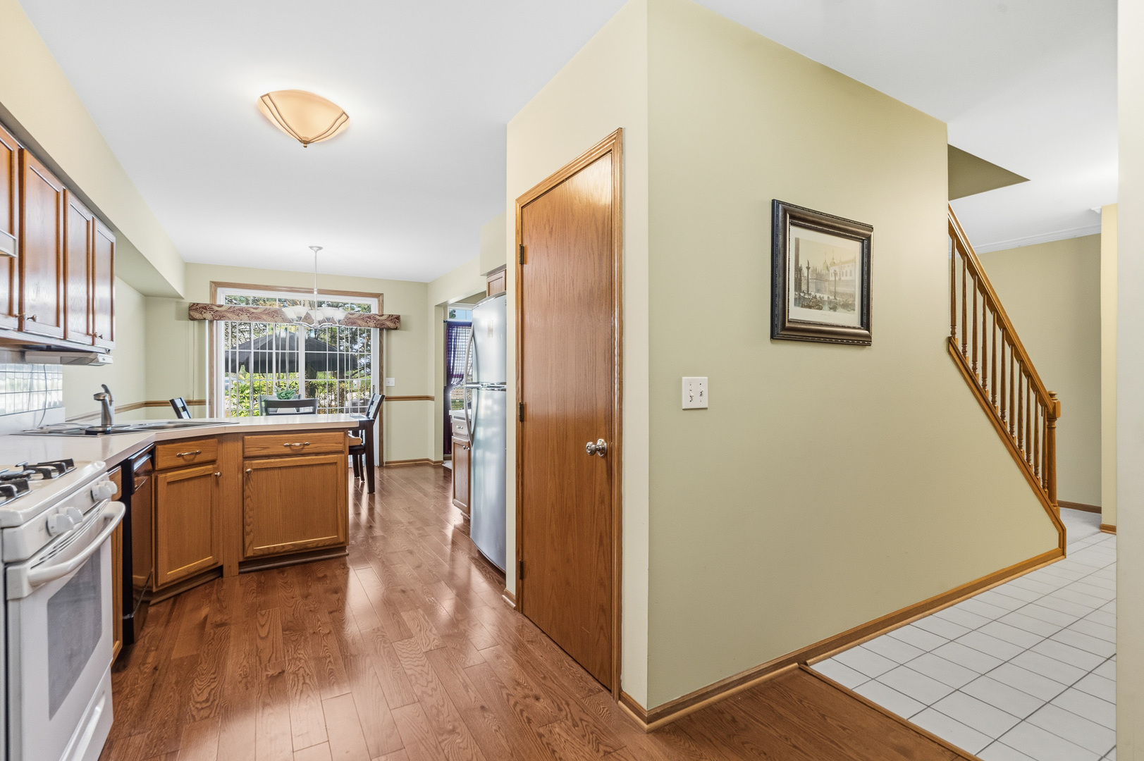 16719 South Sunset Ridge Court Lockport, IL 60441 - Photo 5 of 31 a kitchen with sink and refrigerator