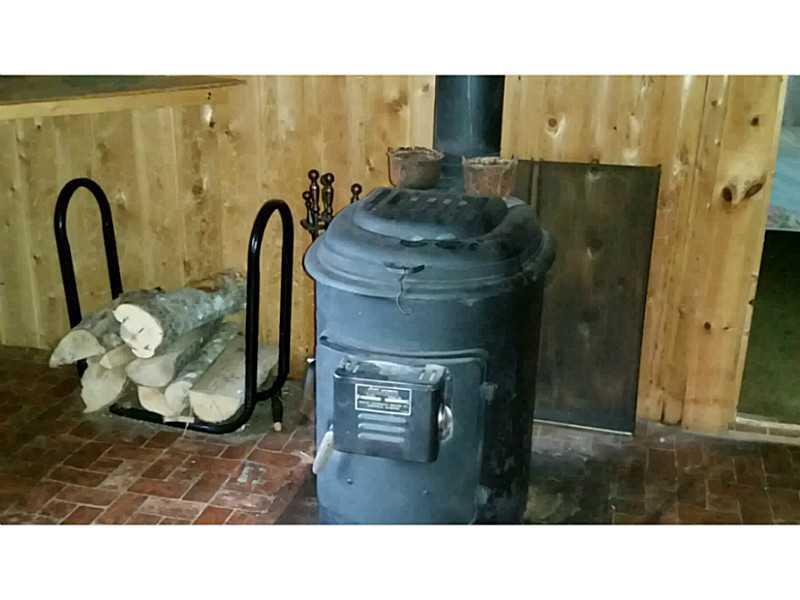 4 Burrill Road Carroll Plt, ME 04487 - Photo 9 of 26 Living Room. wood heat can t be beat!