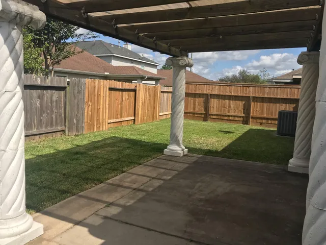 a view of a porch with a backyard
