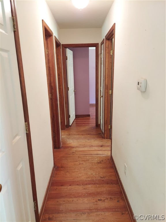 4263 Broad St Road Gum Spring, VA 23065 - Photo 16 of 39 a view of a hallway with wooden floor
