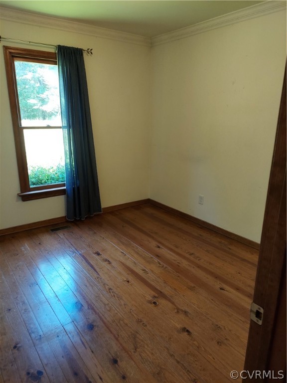 4263 Broad St Road Gum Spring, VA 23065 - Photo 18 of 39 an empty room with wooden floor and windows