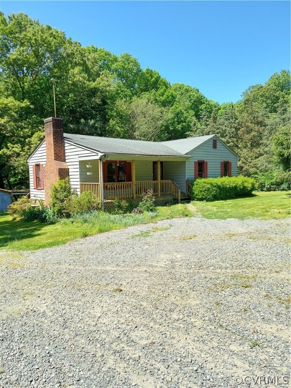 4263 Broad St Road Gum Spring, VA 23065 - Photo 4 of 39 a front view of house with yard and green space