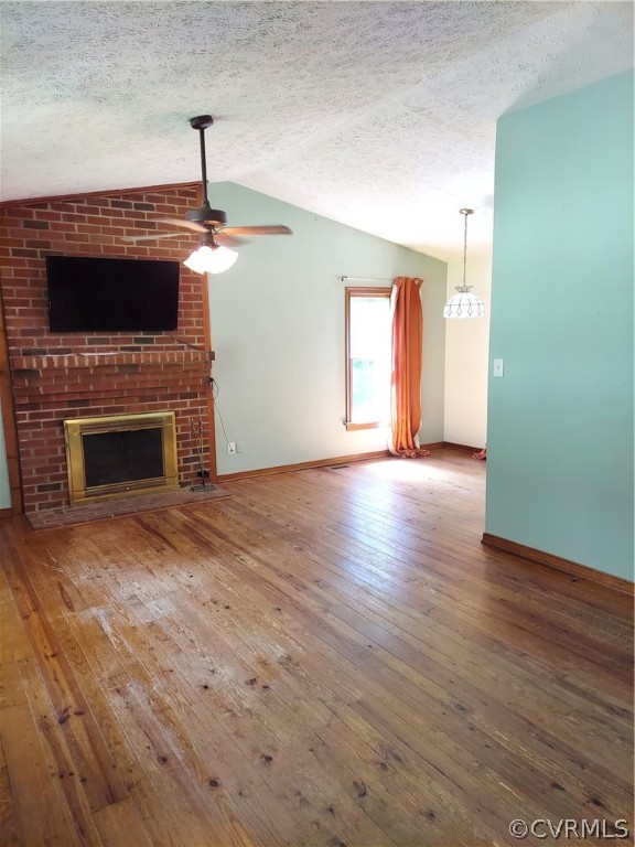 4263 Broad St Road Gum Spring, VA 23065 - Photo 7 of 39 a view of empty room with a fireplace and wooden floor