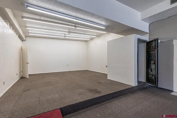 a view of a room with racks on the wall