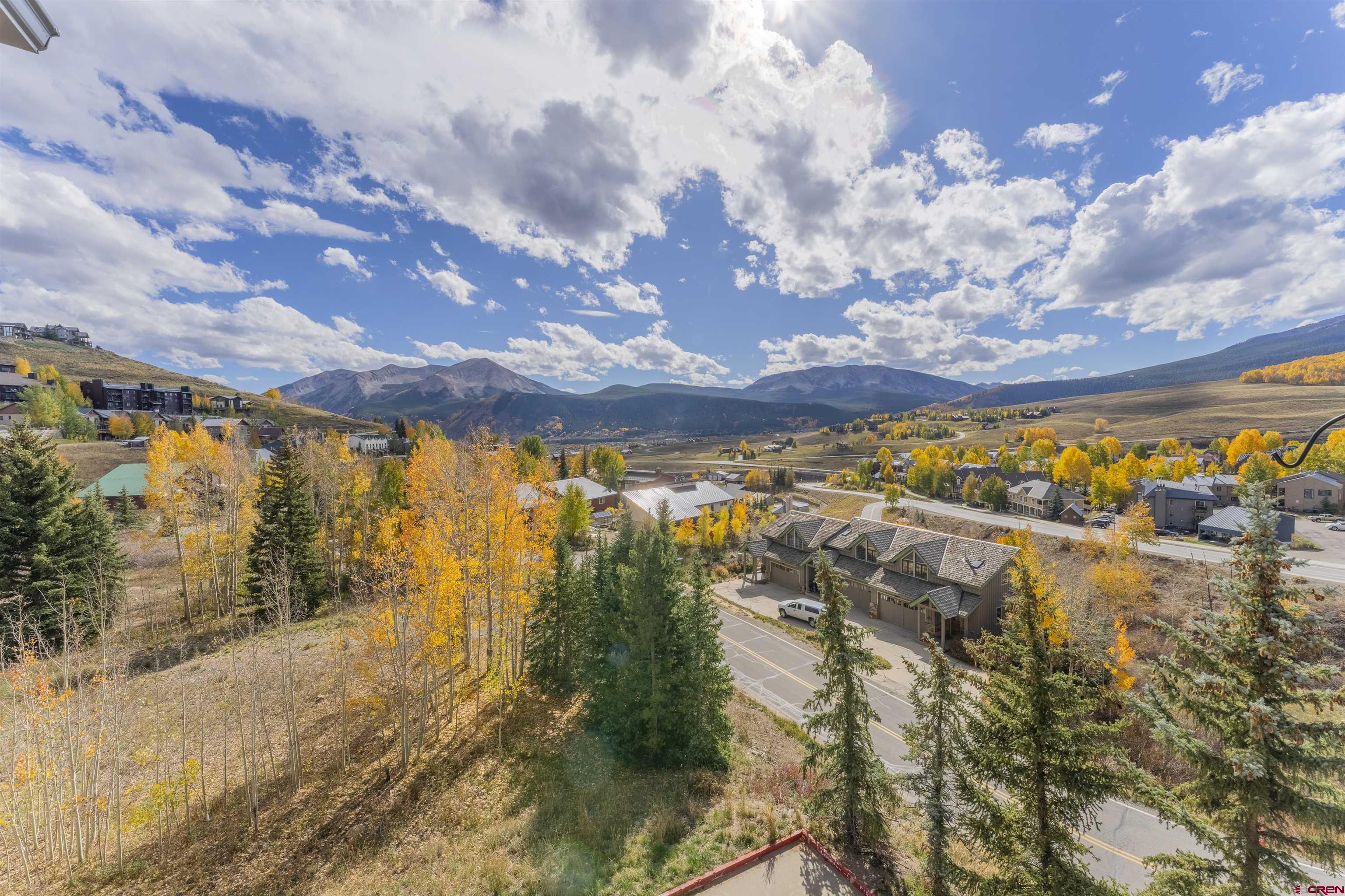 9 Hunter Hill Road, Unit 301 Crested Butte, CO 81225 - Photo 17 of 44 a view of a yard with lake view