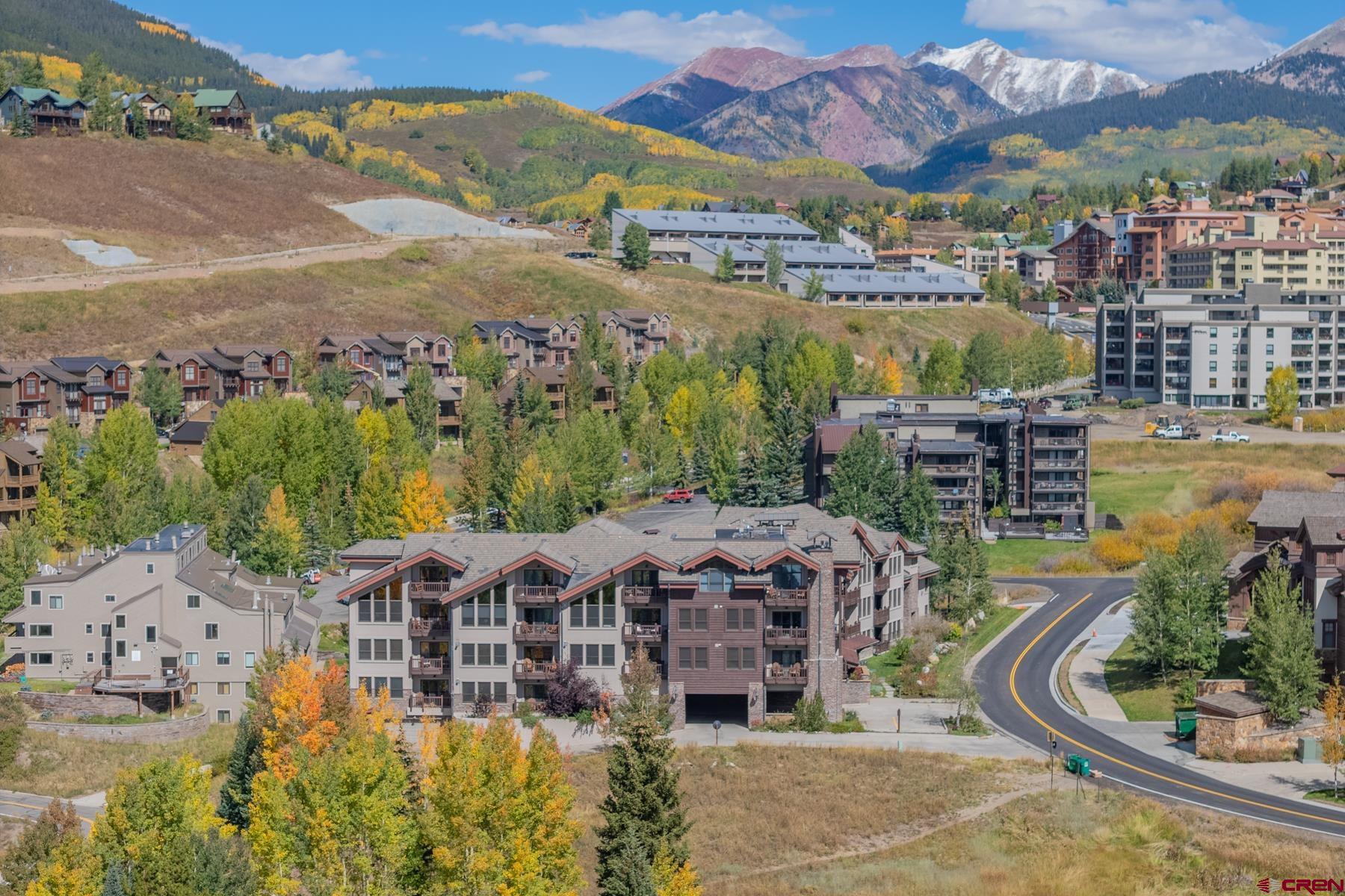 9 Hunter Hill Road, Unit 301 Crested Butte, CO 81225 - Photo 43 of 44 an aerial view of residential houses and outdoor space