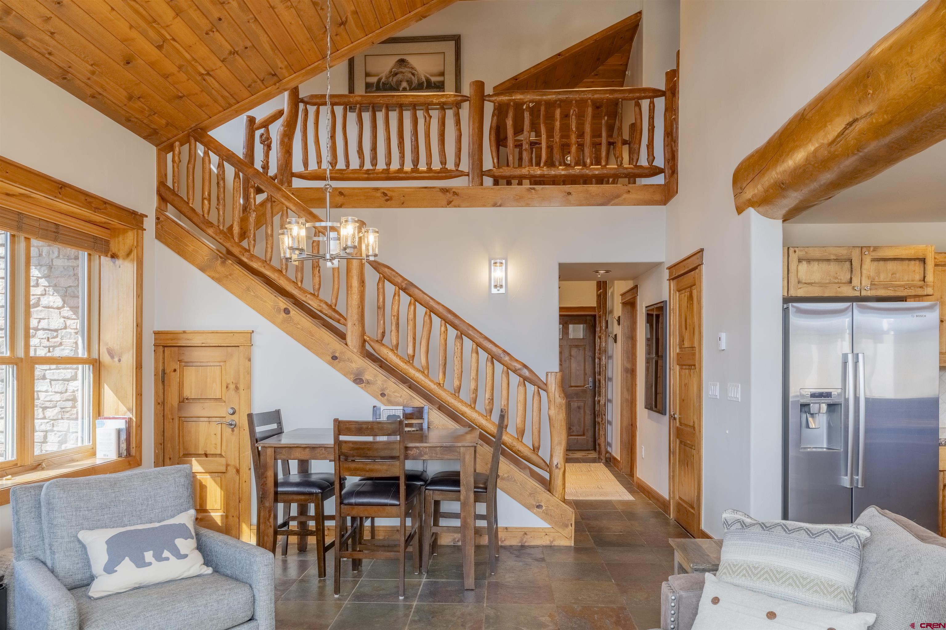 9 Hunter Hill Road, Unit 301 Crested Butte, CO 81225 - Photo 9 of 44 a view of entryway and hall with wooden floor