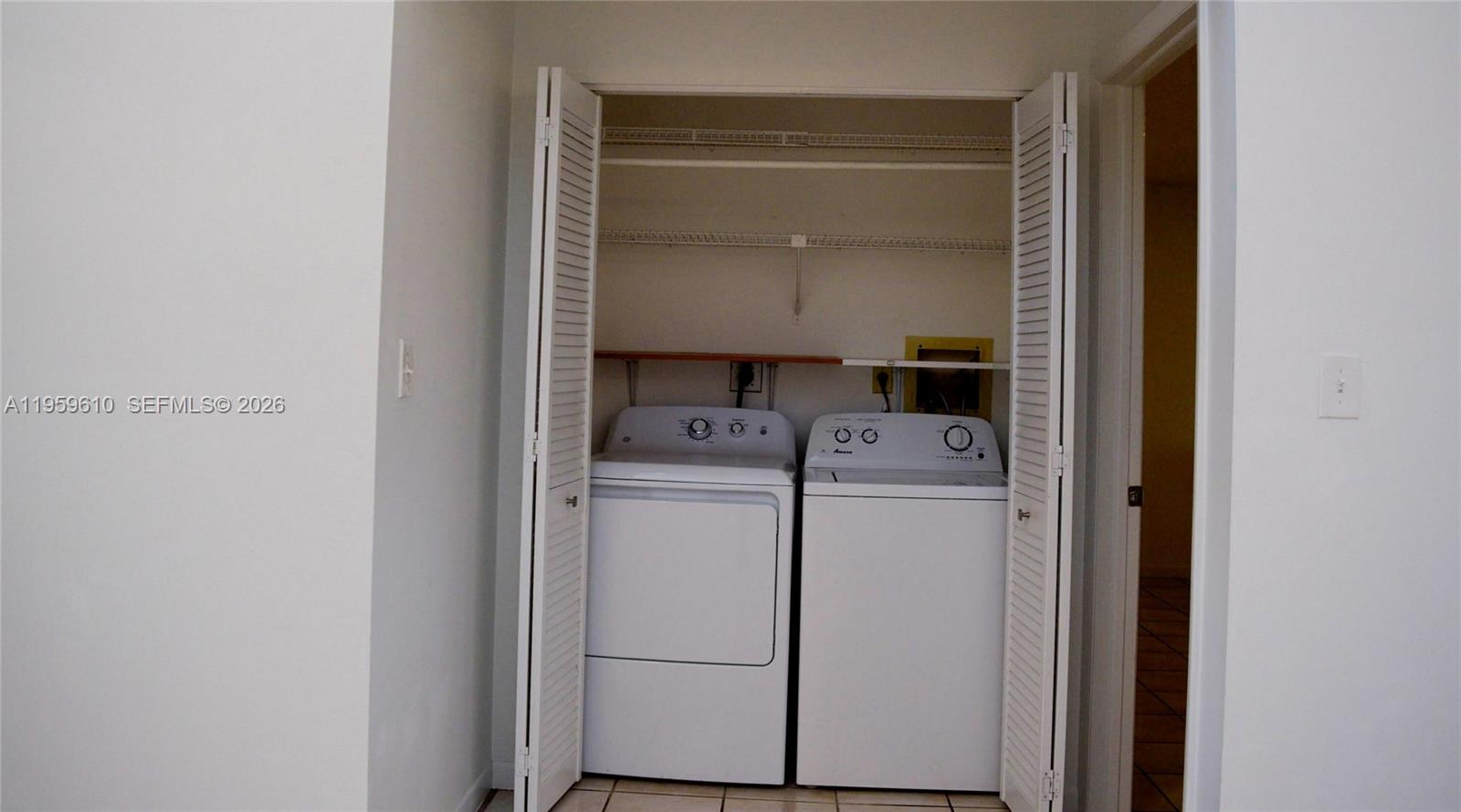9223 Southwest 130th Street, Unit 9223 Miami, FL 33176 - Photo 9 of 12 a utility room with dryer and washer